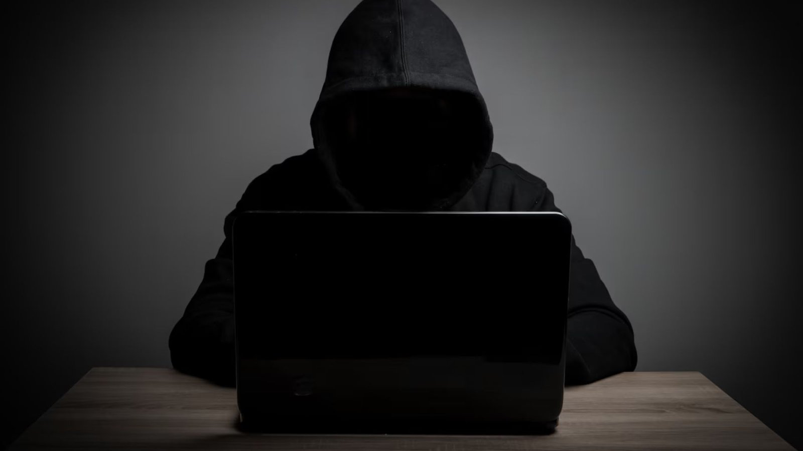 a person hacking through a computer 
