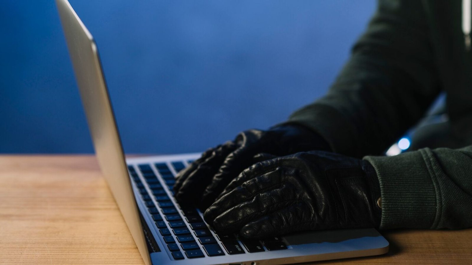 a hacker on a laptop